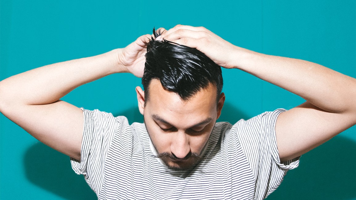 man-hands-on-head-hair-1296-728-header